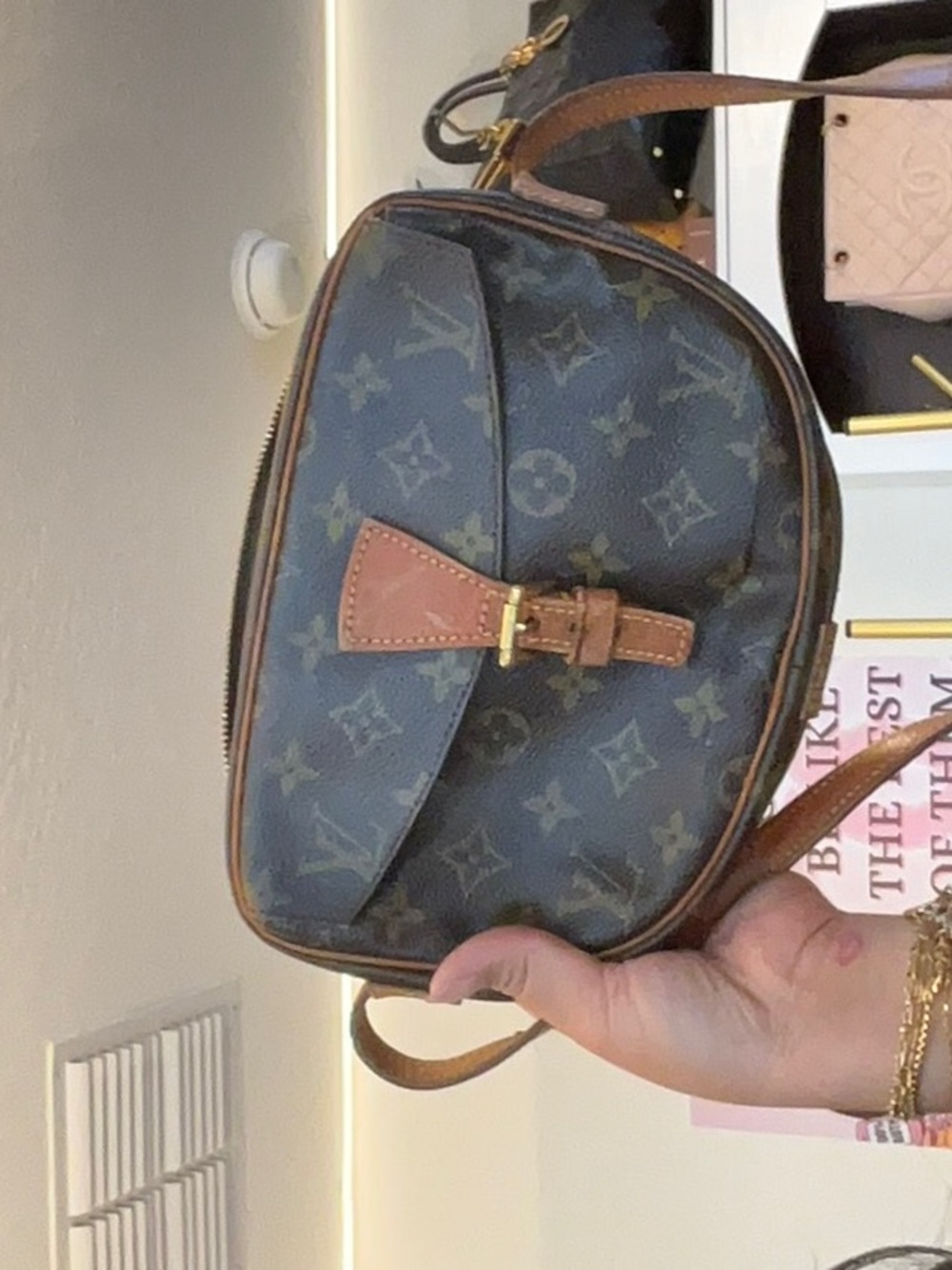 67. lv mono sold as is desc in live no cancel/returns